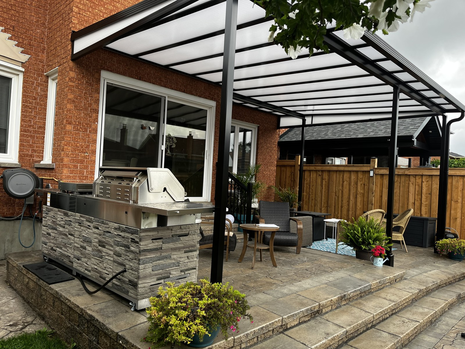 Patio cover over outdoor kitchen and BBQ area